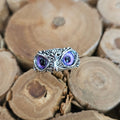 Verstellbarer Eulenring mit violetten Augen