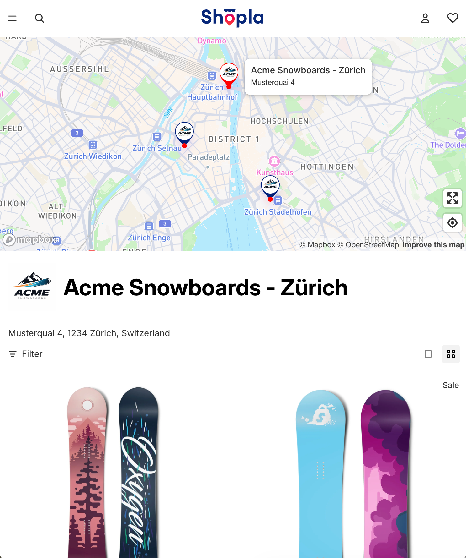 Map of Zürich with Acme Snowboards location and snowboards displayed below.